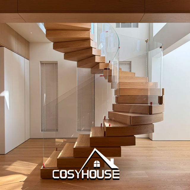 Curved floating staircase with wood treads and glass railing for modern villa interior