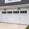 White carriage style sectional garage door with X-panel design