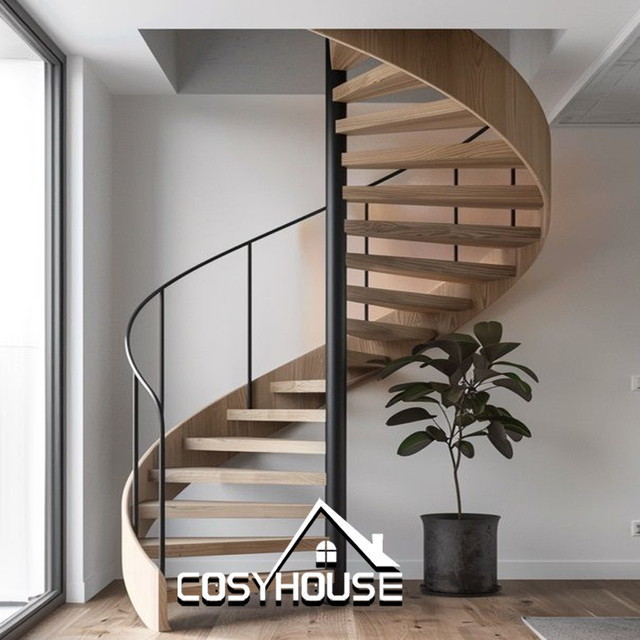Space saving spiral staircase with wood treads and black metal railing for modern home