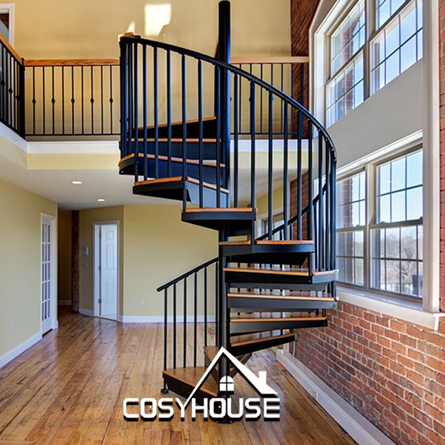 Indoor steel and wood spiral staircase with black metal frame and wood treads for modern home interior